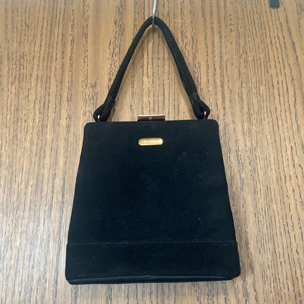 Vintage black  clutch . With gold buckle.